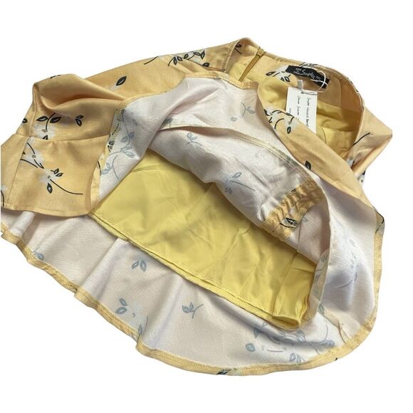 SIMPLEE Yellow Floral Mini Skirt Drawstrings Side Flirty Hemline Women’s L New - Picture 4 of 8